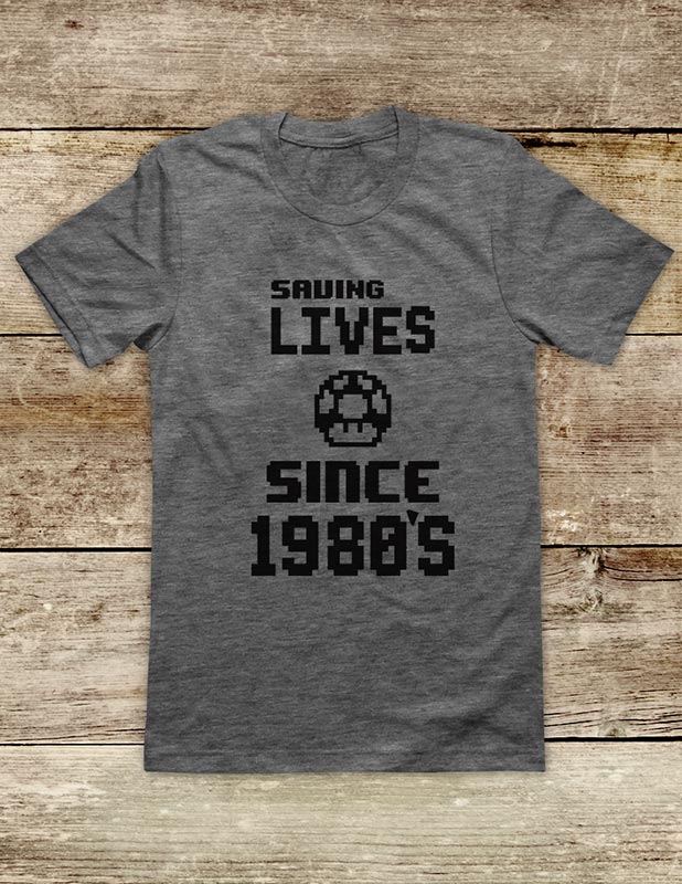 Saving Lives Since 1980's retro vintage Video Game Soft Unisex Men or Women Short Sleeve Jersey Tee Shirt