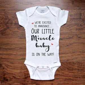 We're excited to announce Our Little Miracle Baby is on the way! baby onesie pregnancy reveal announcement surprise grandparents